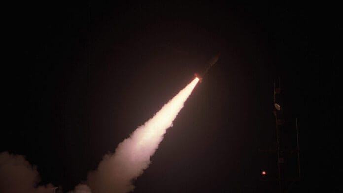 A ballistic missile is launched during a night test, illustrating long-range strike capabilities. A ballistic missile is launched during a night test, illustrating long-range strike capabilities.