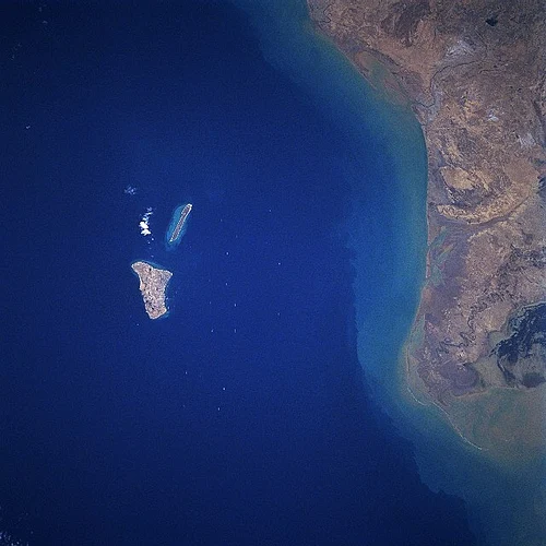 Satellite view of Kharg Island in the Persian Gulf, Iran’s main oil export hub. Satellite view of Kharg Island in the Persian Gulf, Iran’s main oil export hub.