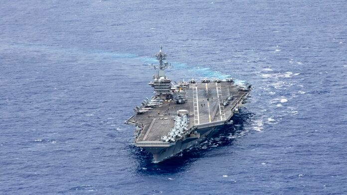 USS Abraham Lincoln operates at sea during US Navy deployment