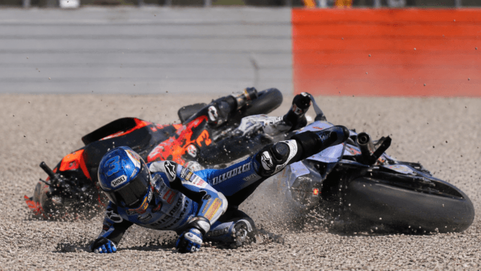 MotoGP rider crashes at high speed during the Catalonia Grand Prix in Barcelona.