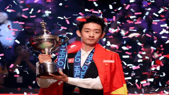 Wu Yize playing a decisive snooker shot during a high-stakes championship final